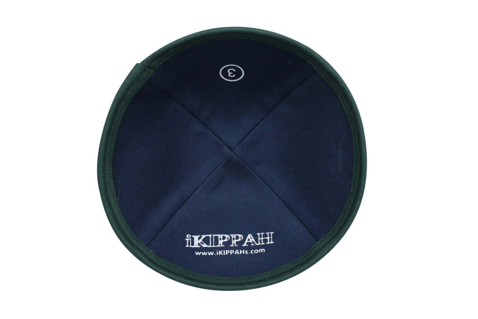 A green velvet iKIPPAH brand yarmulke inside view.