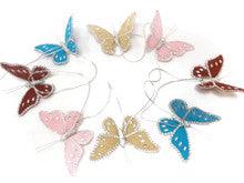 9' Butterfly garland with 8 6" butterflies