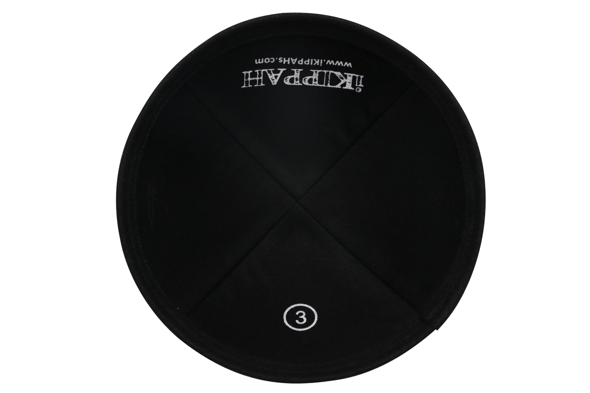 A gray iKIPPAH brand yarmulke with a black bottom rim inside view.