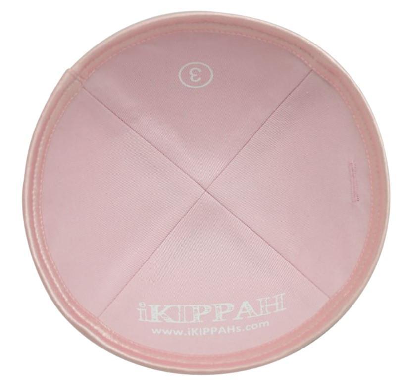 Fashionable pink burlap iKippah top view.