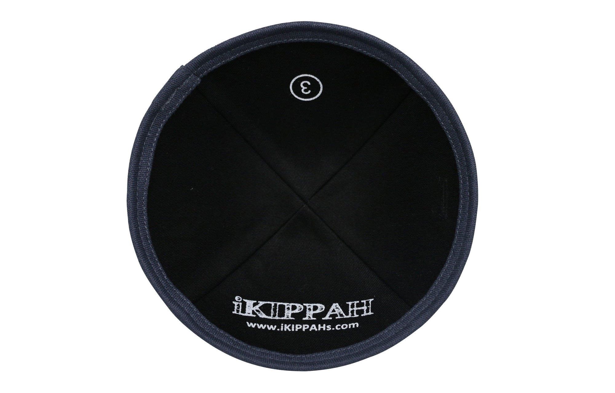 A black linen iKIPPAH brand yarmulke with a grey rim bottom border inside view.