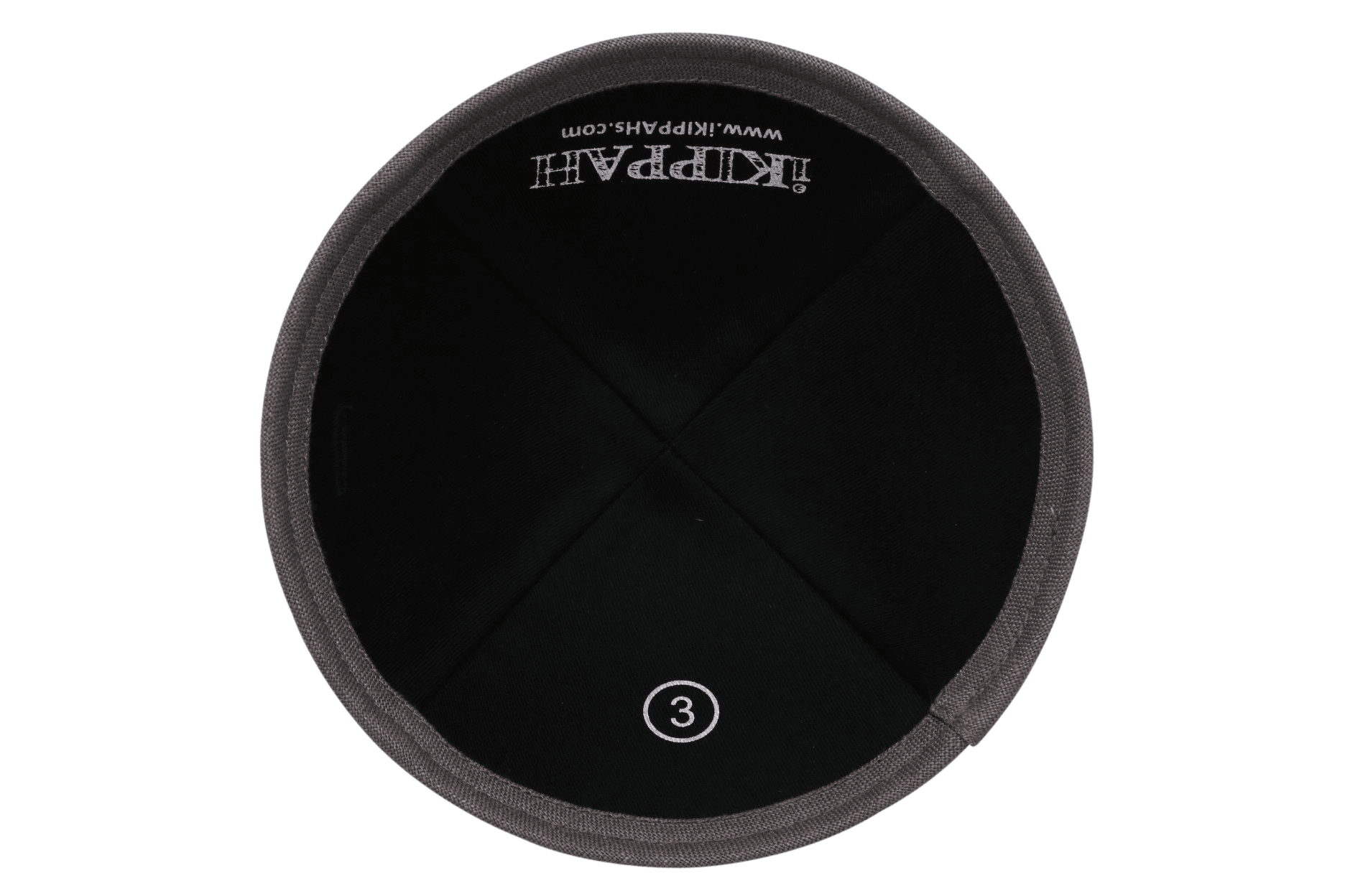 A black linen iKIPPAH brand yarmulke with a light gray bottom rim inside view.