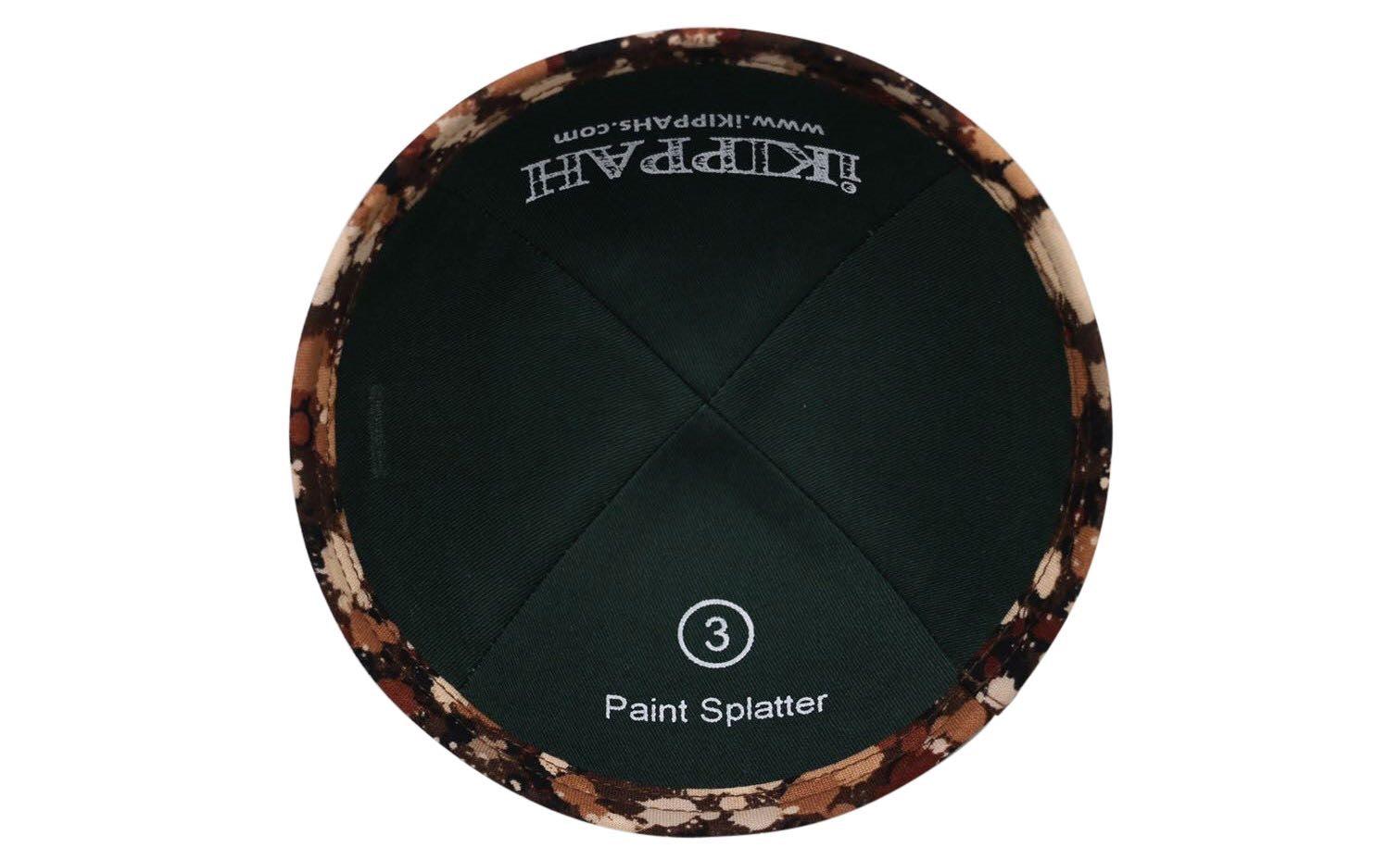 An iKIPPAH brand yarmulke that recreates the look of brown paint splatters inside view.