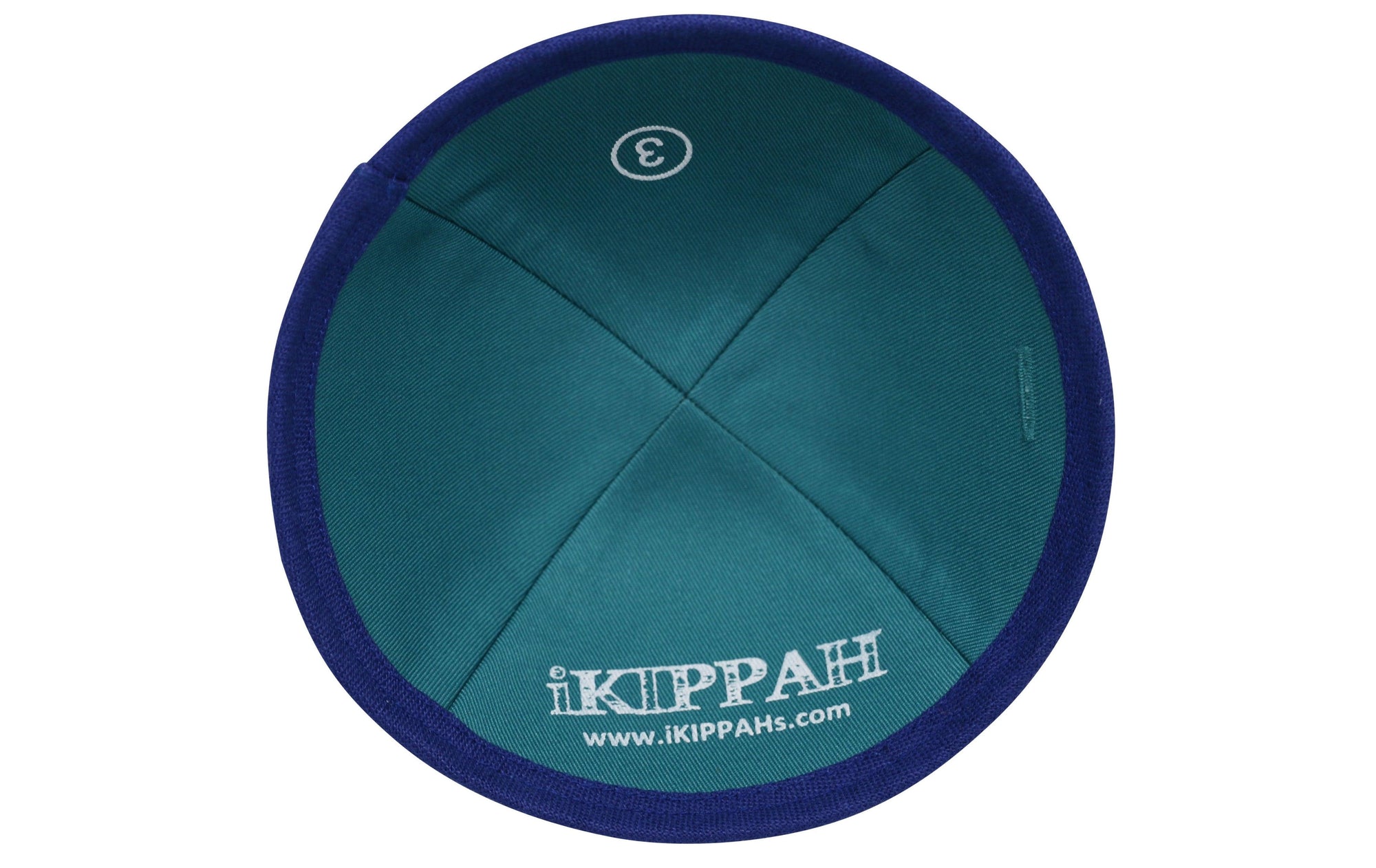 A bright royal blue iKIPPAH brand yarmulke inside view.