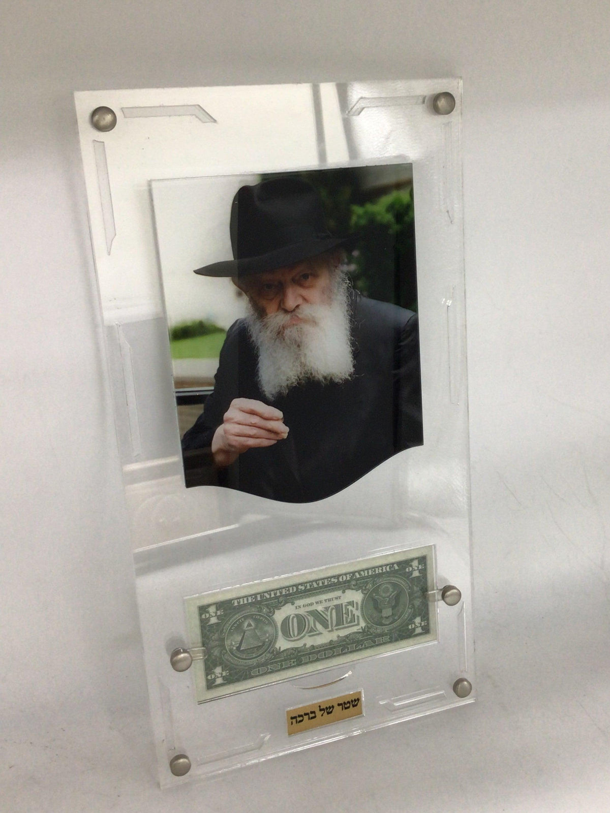 Lucite Print of the Rebbe holding a coin, with dollar, 12x18